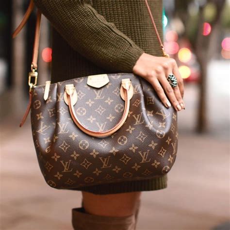 authentic designer handbags auction sites.